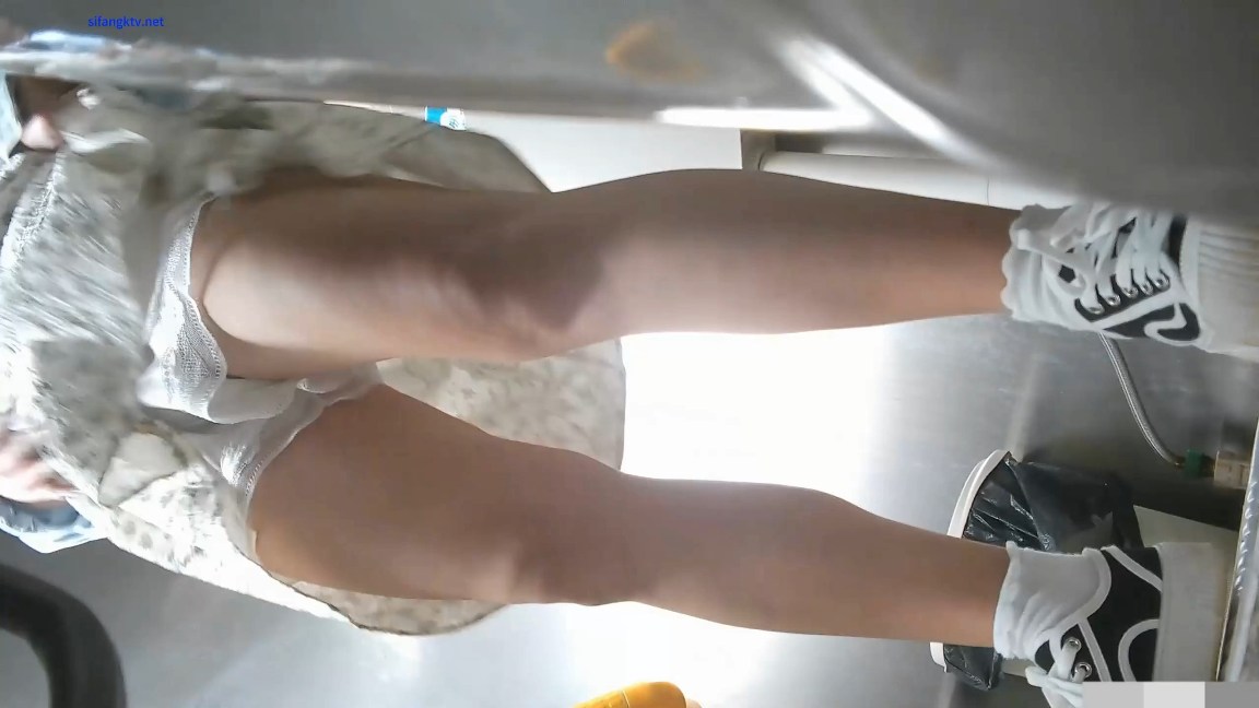 Chinese Student Squatting Over Spy Lens