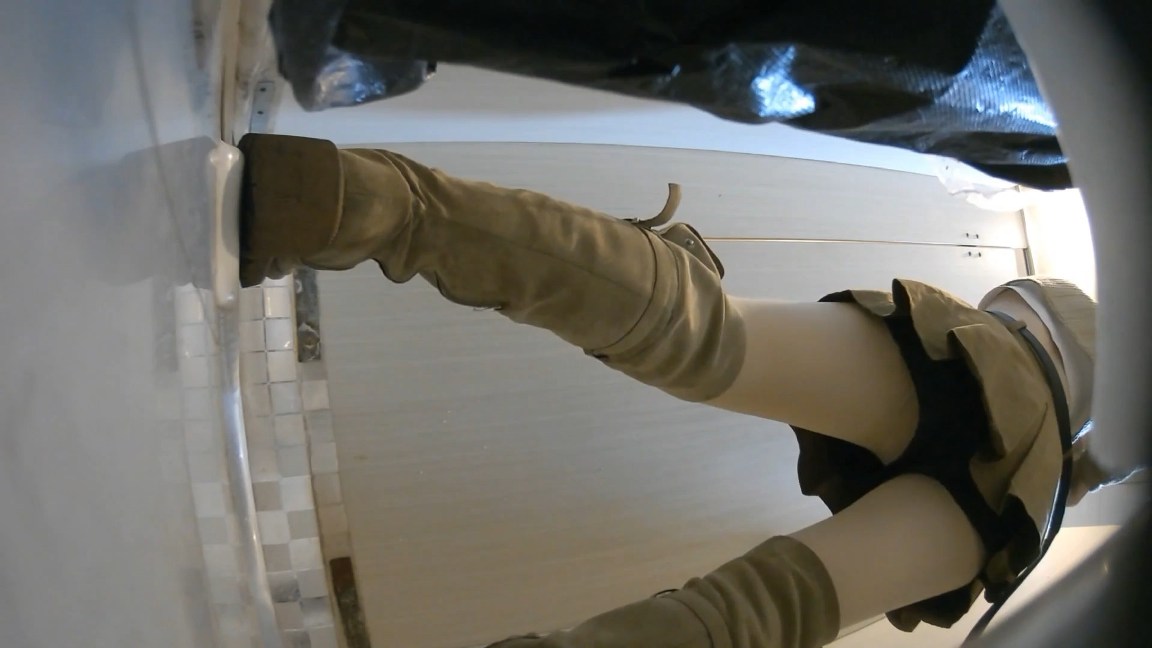 Curvy Chinese Girl in Tall Boots Squatting and Peeing Close Up